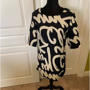 Graphic Tunic or dress in dark navy almost black with cream.